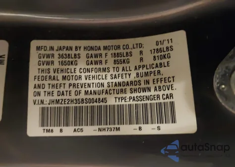 2011 Honda Insight z USA, uszkodzony, nr VIN JHMZE2H35BS004845